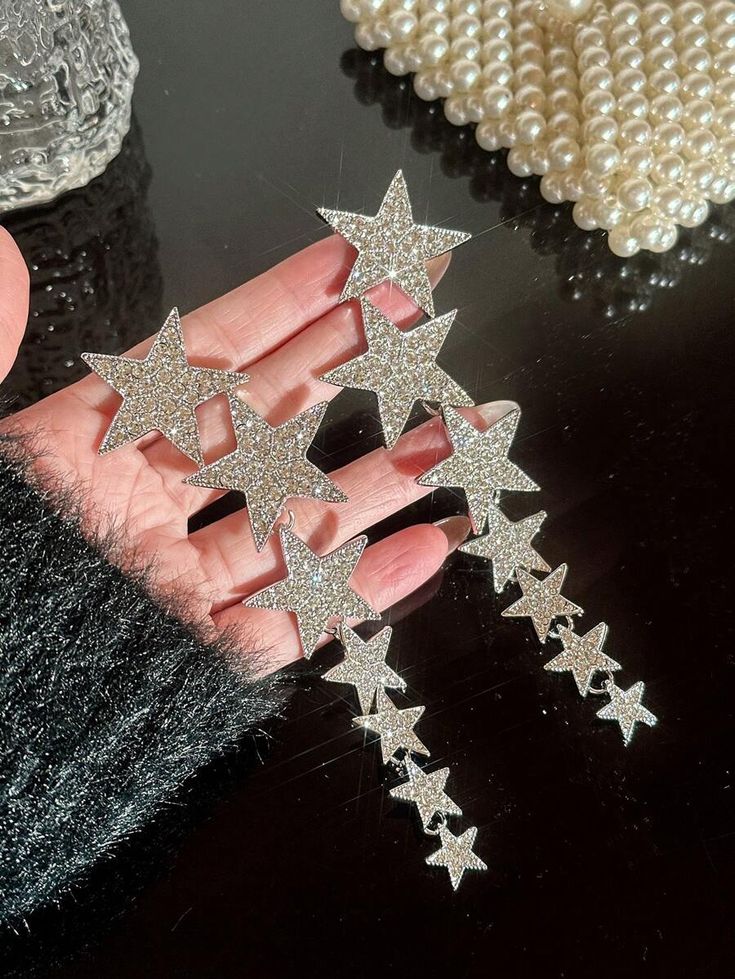 Andkiss A pair of crystal studded star earrings with tassels, suitable for daily wear